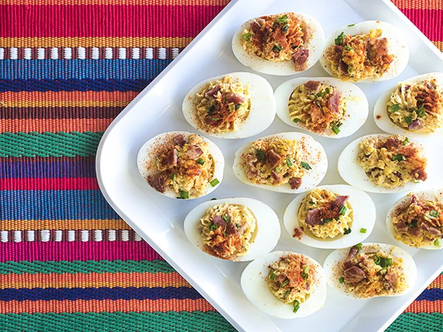 Deviled Eggs Overhead on Tray and Colorful Placemat Horiz