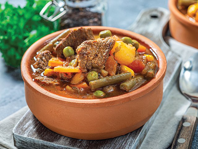 Savory Beef Stew with Peas and Carrots in Clay Pot.jpg