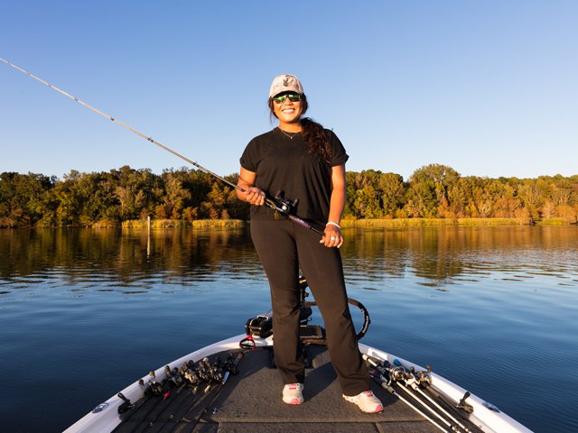 Anastasia-Patterson-Sumter-woman-angling-fishing-boat-lake-sunset.png