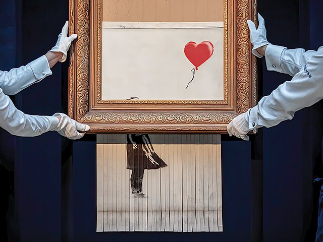 Shredded Artwork with Red Balloon- A Striking Example of Modern Art.png