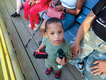 train-museum-boy-with-toy-train.png