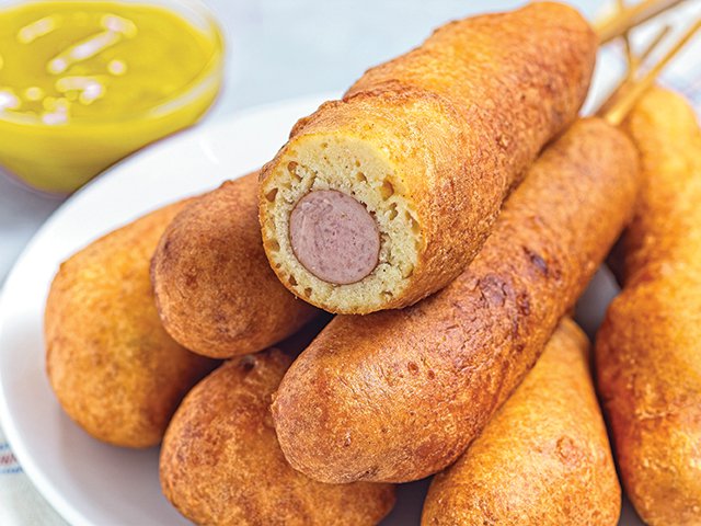 Classic Corn Dogs with Mustard - Fair Food by Iuliia Nedrygailova.png