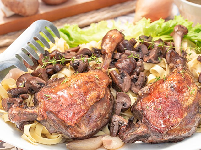 Roasted Duck Legs with Red Wine Mushroom Sauce on Egg Noodles.png